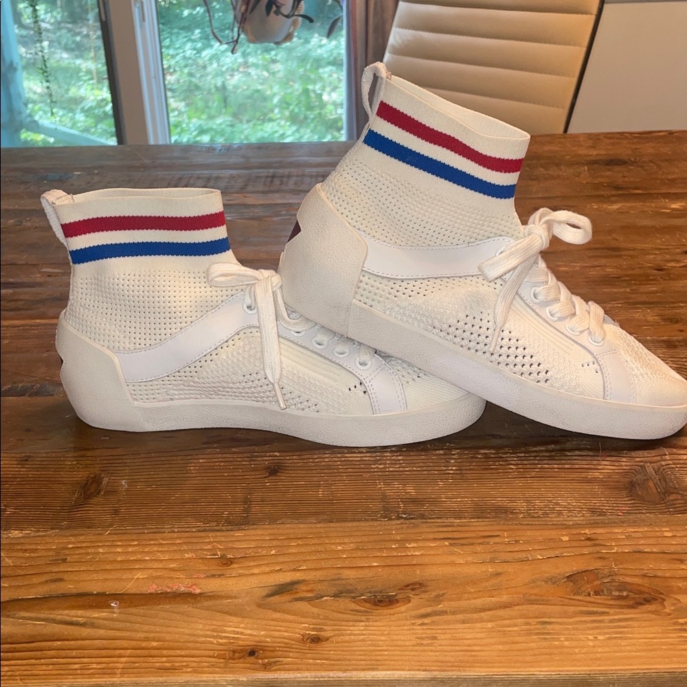 Ash White Sneakers with Blue and Red Stripes.